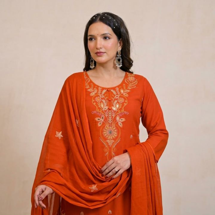 Bottle green kurta with a Kalamkari printed dupatta